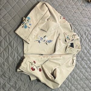 Romeo & Juliet Couture Cream Leather Jacket with Floral Embroidery